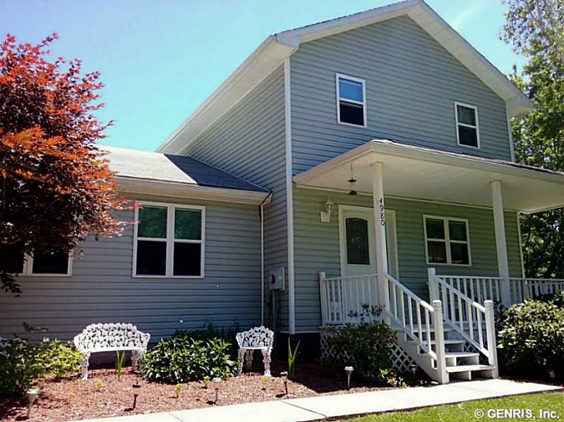 4980 Lewis Road Walworth, NY 14568 - Photo 1 of 1 Exterior Front. MANICURED YARD OPEN FRONT PORCH. N