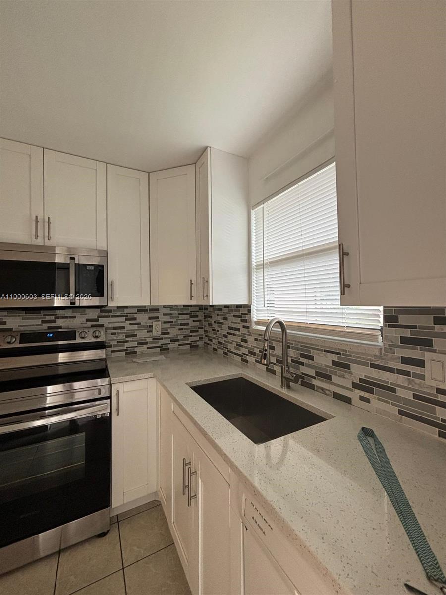 21904 Lake Forest Circle, Unit 203 Boca Raton, FL 33433 - Photo 1 of 11