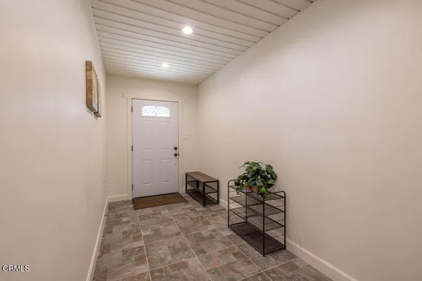 a room with cabinets and wooden floor