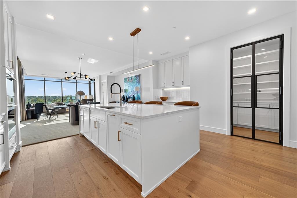 2520 Peachtree Road Northwest, Unit 903 Atlanta, GA 30305 - Photo 13 of 62 a large white kitchen with a large window