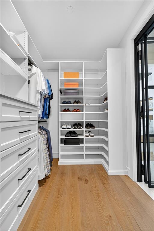 2520 Peachtree Road Northwest, Unit 903 Atlanta, GA 30305 - Photo 27 of 62 a view of walk in closet with empty racks