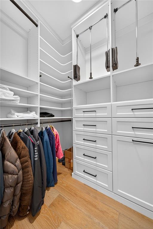 2520 Peachtree Road Northwest, Unit 903 Atlanta, GA 30305 - Photo 29 of 62 a view of walk in closet with clothes and shoes