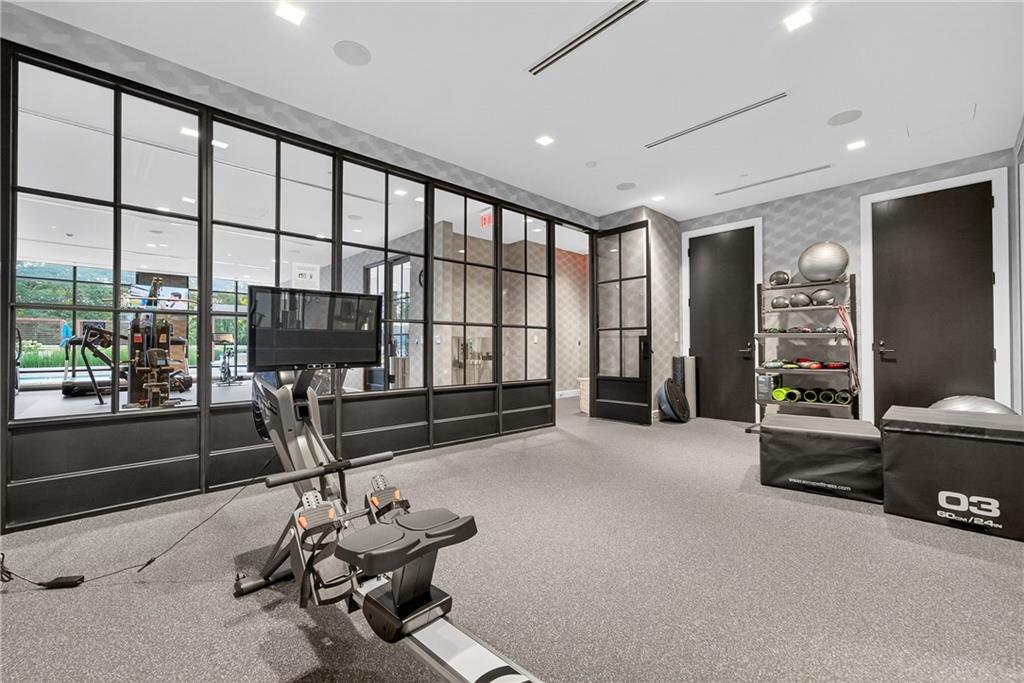 2520 Peachtree Road Northwest, Unit 903 Atlanta, GA 30305 - Photo 54 of 62 a view of a room with gym equipment