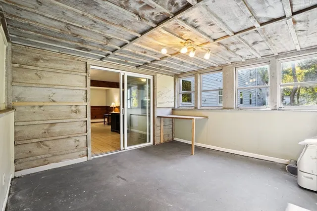 a view of a hallway with a large window