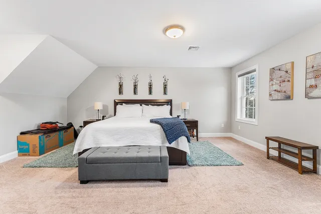 a bedroom with furniture and a couch