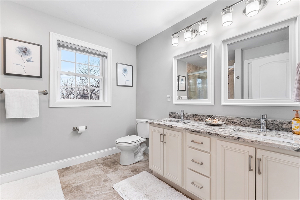 29 Dawley Road Westminster, MA 01473 - Photo 16 of 30 a bathroom with a granite countertop toilet sink and mirror