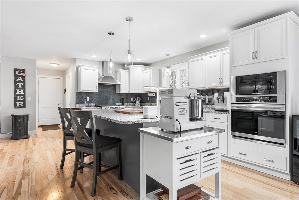 29 Dawley Road Westminster, MA 01473 - Photo 2 of 30 a kitchen with stainless steel appliances kitchen island granite countertop a wooden cabinets and white appliances