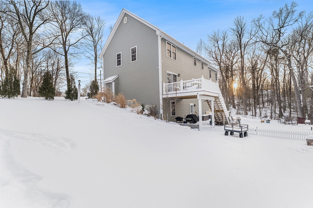 29 Dawley Road Westminster, MA 01473 - Photo 25 of 30 a view of a house with snow on the road
