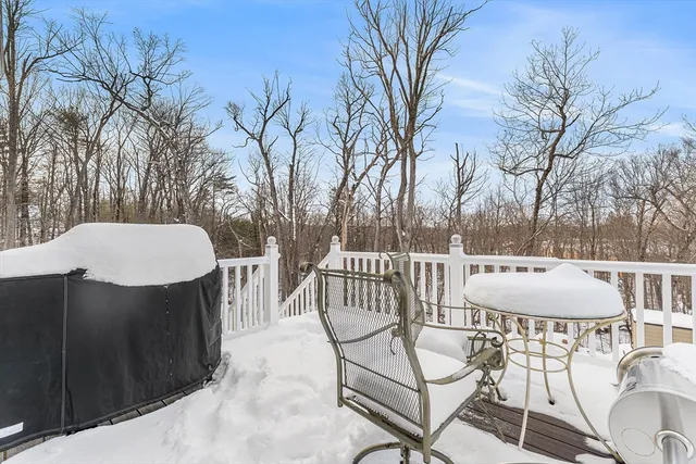a view of a chairs and table in the patio
