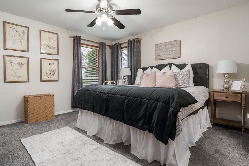 320 Lake Lida Lane Rochelle, IL 61068 - Photo 19 of 43 a bedroom with a large bed and a window