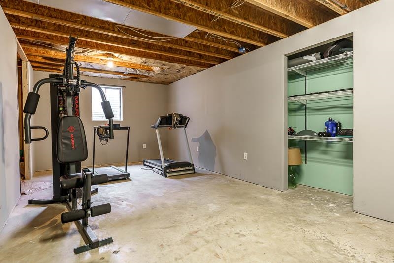 320 Lake Lida Lane Rochelle, IL 61068 - Photo 32 of 43 a view of a room with gym equipment