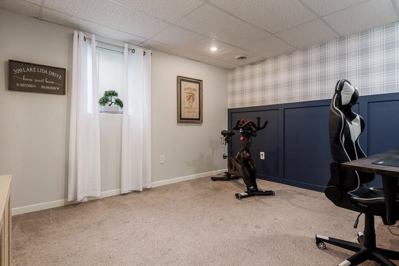 320 Lake Lida Lane Rochelle, IL 61068 - Photo 33 of 43 a view of a room with gym equipment