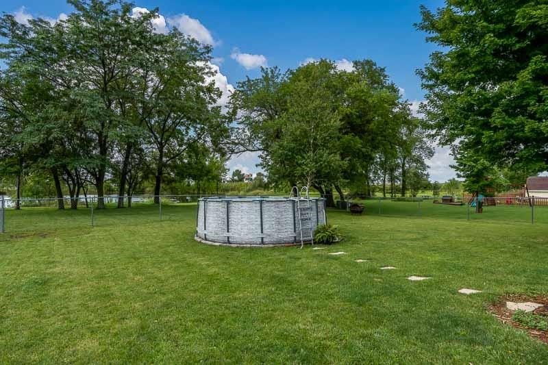 320 Lake Lida Lane Rochelle, IL 61068 - Photo 40 of 43 a view of a park with large trees
