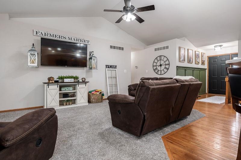 320 Lake Lida Lane Rochelle, IL 61068 - Photo 10 of 43 a living room with furniture and a flat screen tv