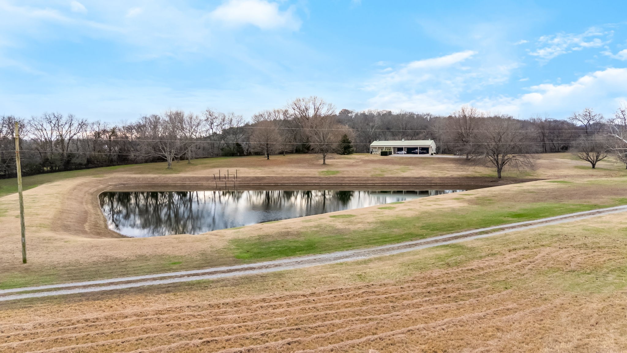 3100 Floyd Road Eagleville, TN 37060 - Photo 35 of 62 a view of a swimming pool with a yard