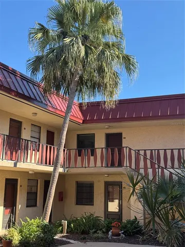 a view of multiple houses with a yard