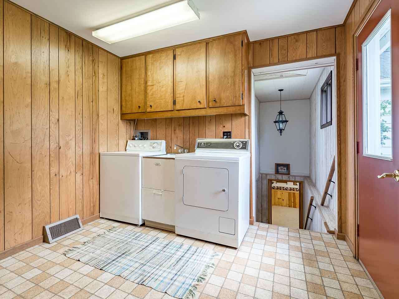 10208 Center Road Durand, IL 61024 - Photo 24 of 25 a room with a stove a sink and a refrigerator