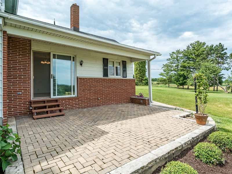 10208 Center Road Durand, IL 61024 - Photo 7 of 25 a view of a house with backyard and a tree