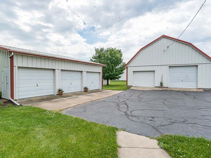 10208 Center Road Durand, IL 61024 - Photo 8 of 25 a view of a house with a yard