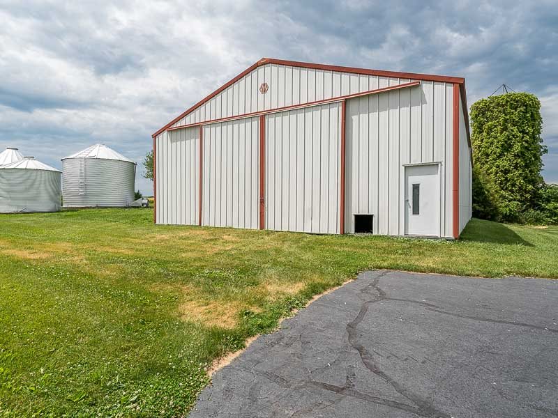 10208 Center Road Durand, IL 61024 - Photo 9 of 25 a view of a house with backyard and garden