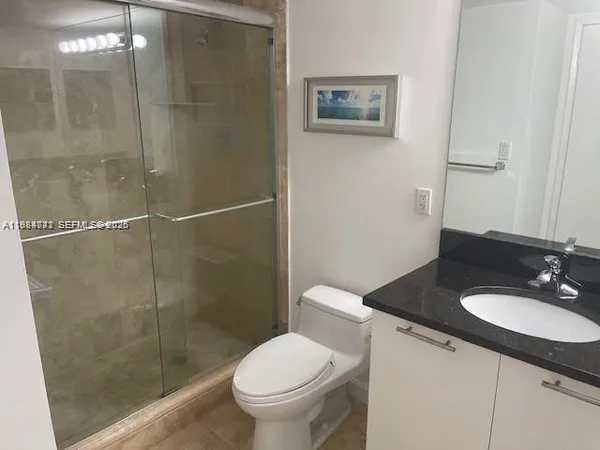 a view of a balcony with chairs