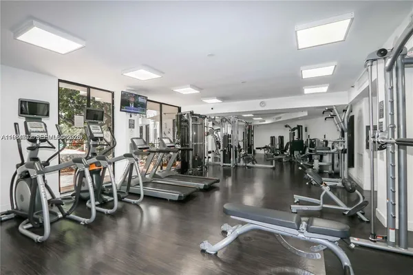 a view of a livingroom with furniture and furniture