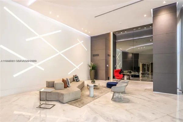 a front view of multiple houses with yard