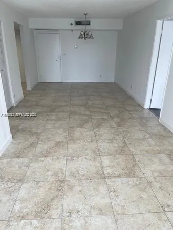 a kitchen with stainless steel appliances a sink dishwasher a stove microwave and cabinets