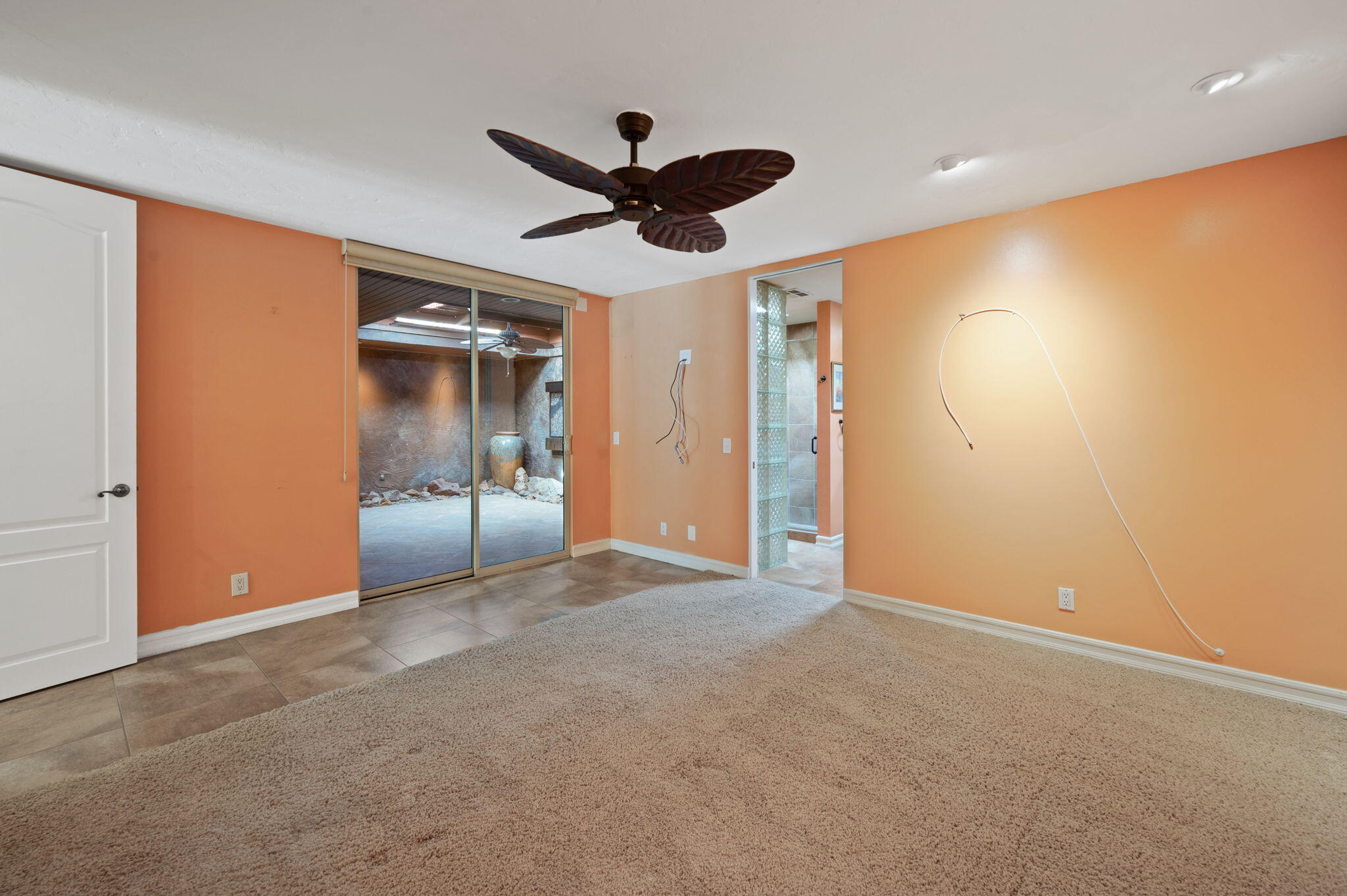 77675 Seminole Road Indian Wells, CA 92210 - Photo 22 of 40 a view of an empty room with a ceiling fan