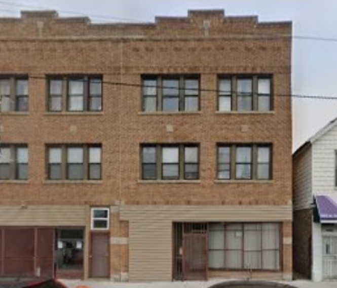 5816 West Chicago Avenue, Unit 2 Chicago, IL 60651 - Photo 1 of 10 a front view of a building with lake view
