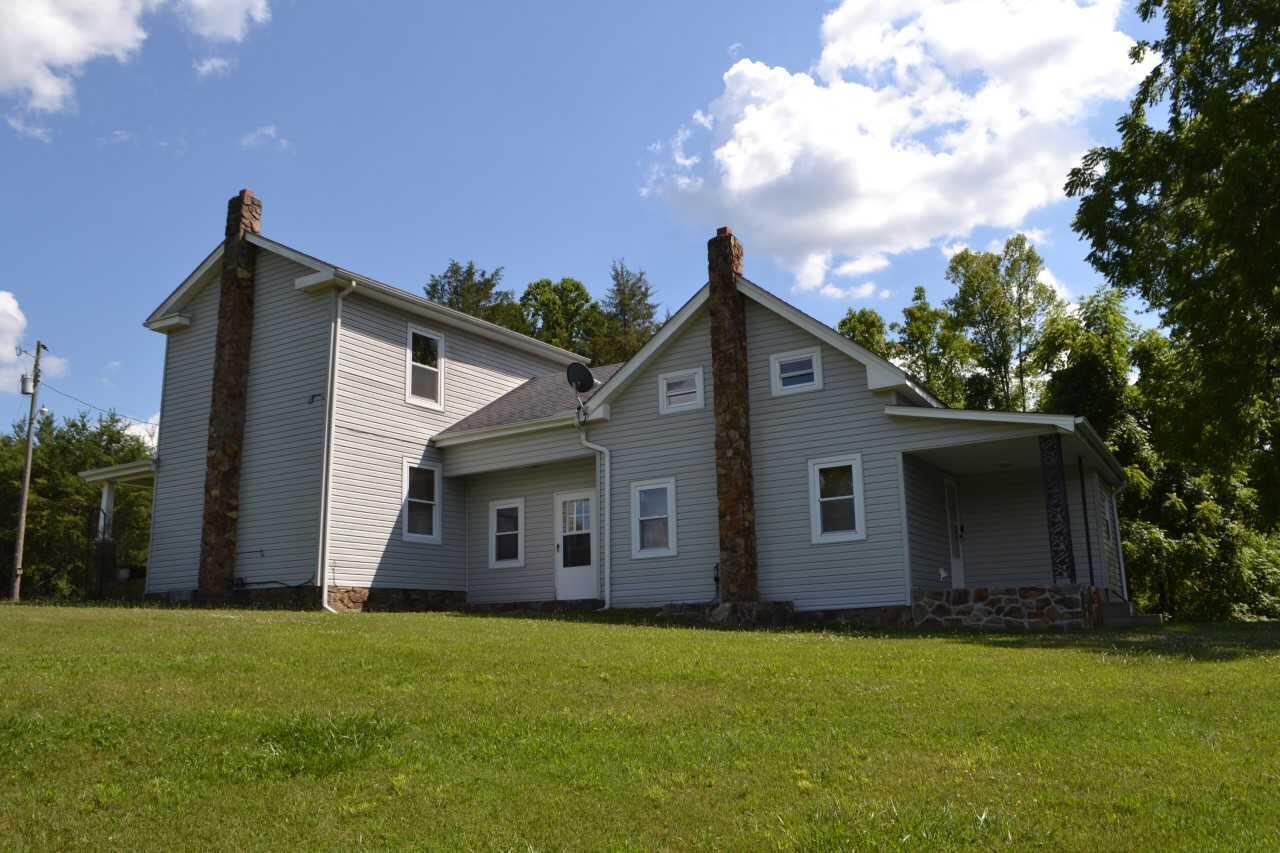 1633 Hatchett Road Penhook, VA 24137 - Photo 3 of 15 a front view of a house with garden