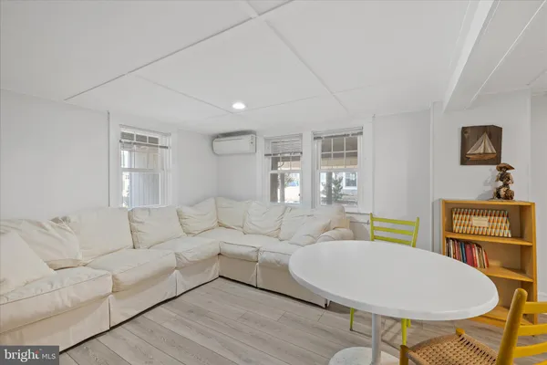 a bedroom with double bed and a window