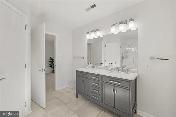 a view of a balcony with furniture and city view