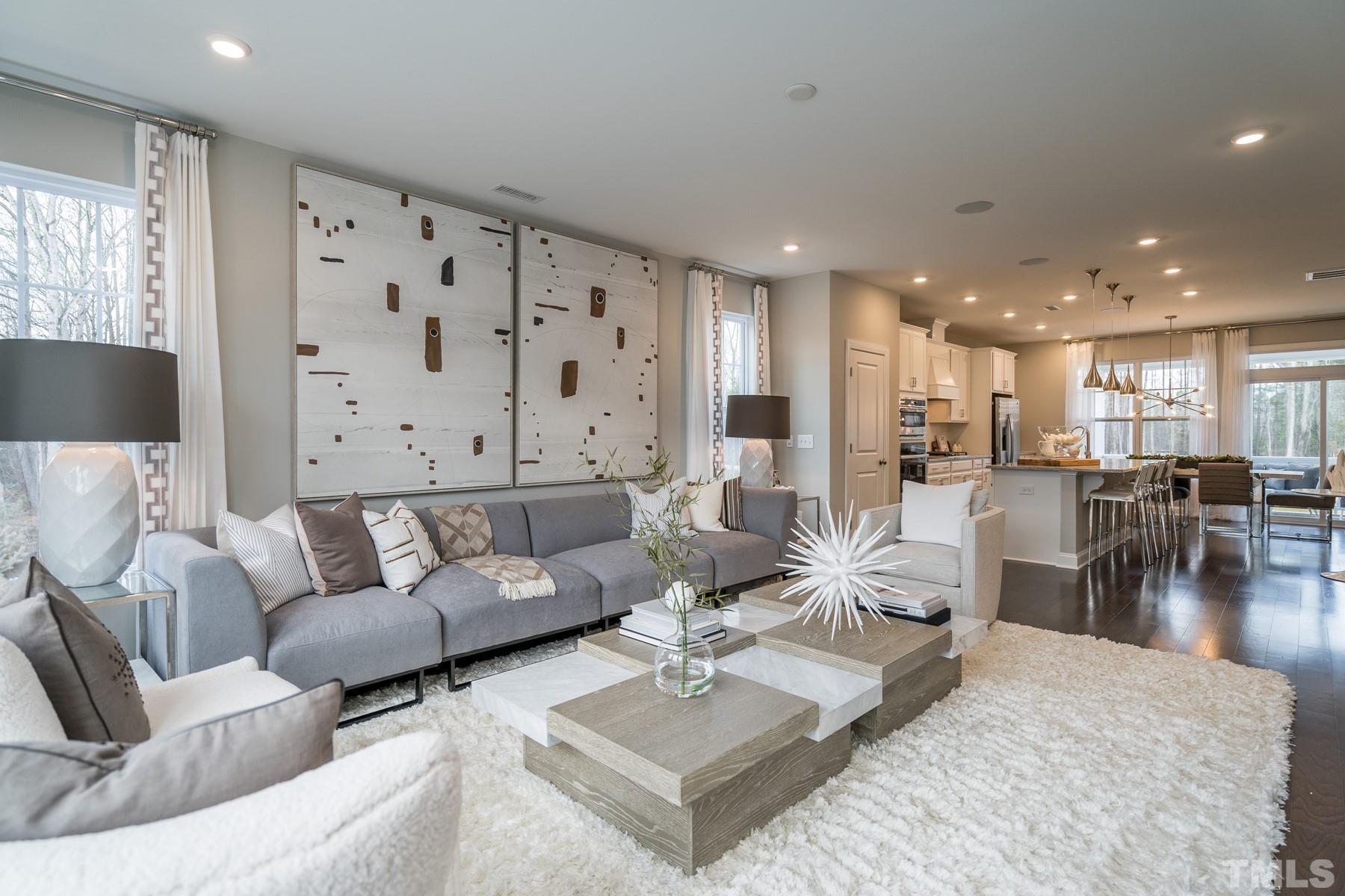 2225 Kettle Falls Station, Unit 392 Apex, NC 27502 - Photo 23 of 52 a living room with furniture and view of kitchen