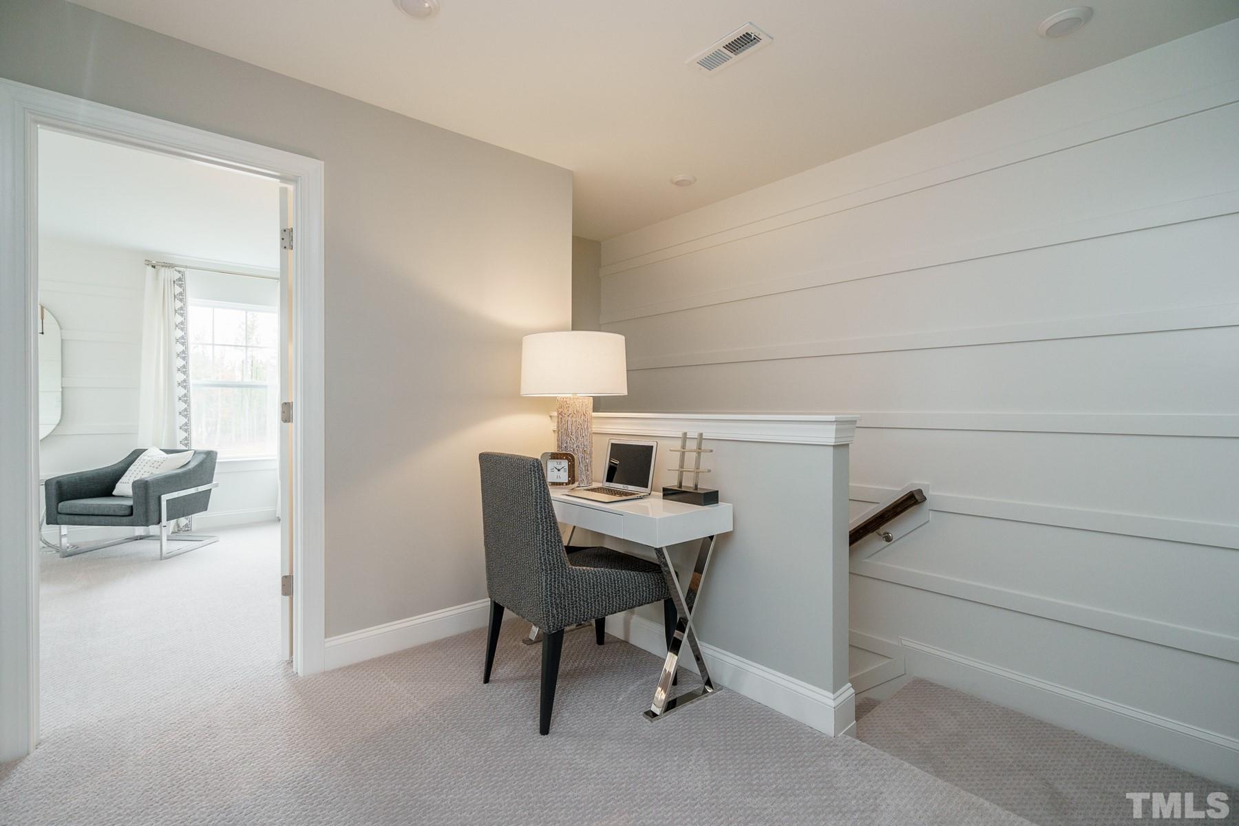 2225 Kettle Falls Station, Unit 392 Apex, NC 27502 - Photo 34 of 52 a view of a workspace with furniture