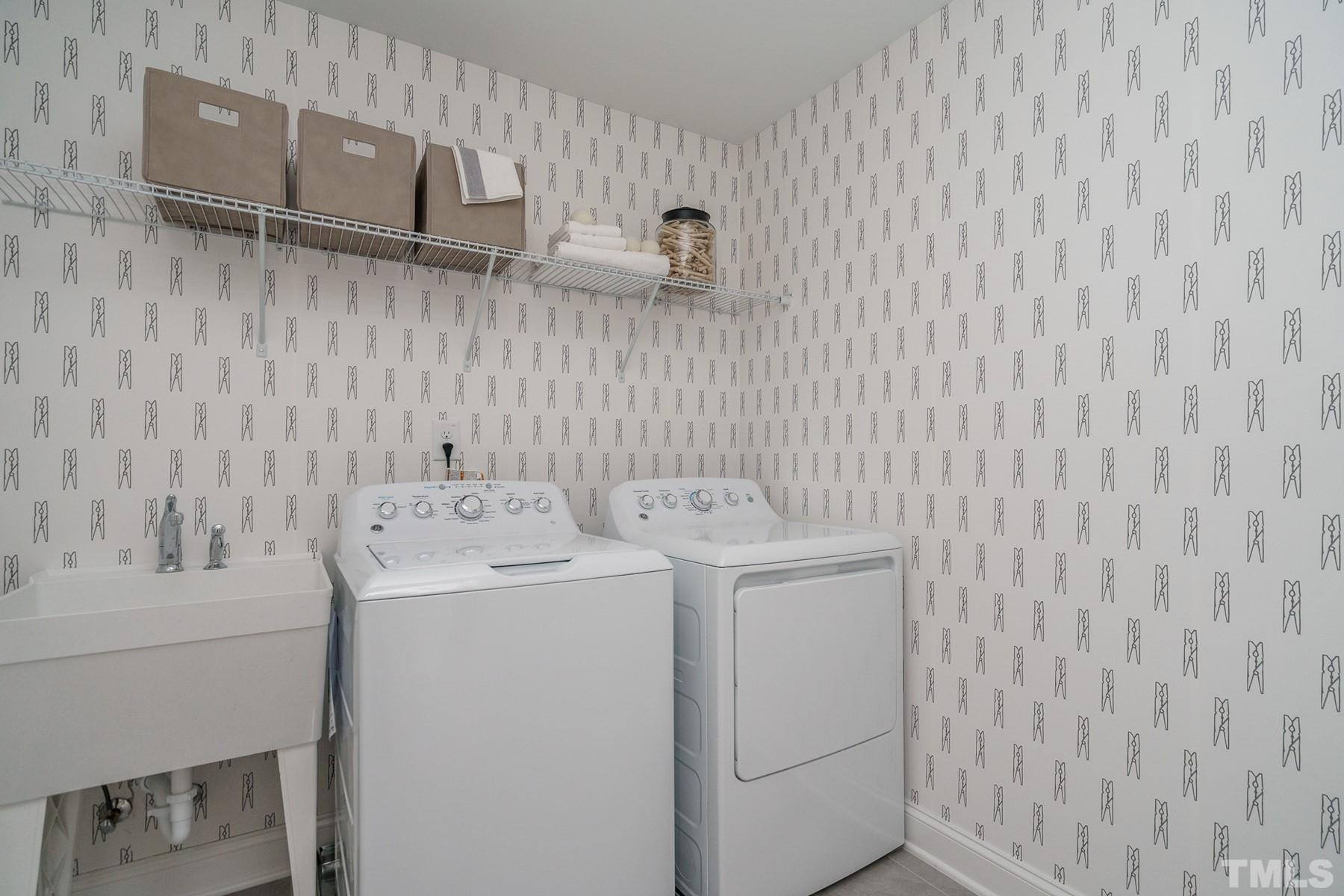 2225 Kettle Falls Station, Unit 392 Apex, NC 27502 - Photo 43 of 52 a utility room with dryer and washer