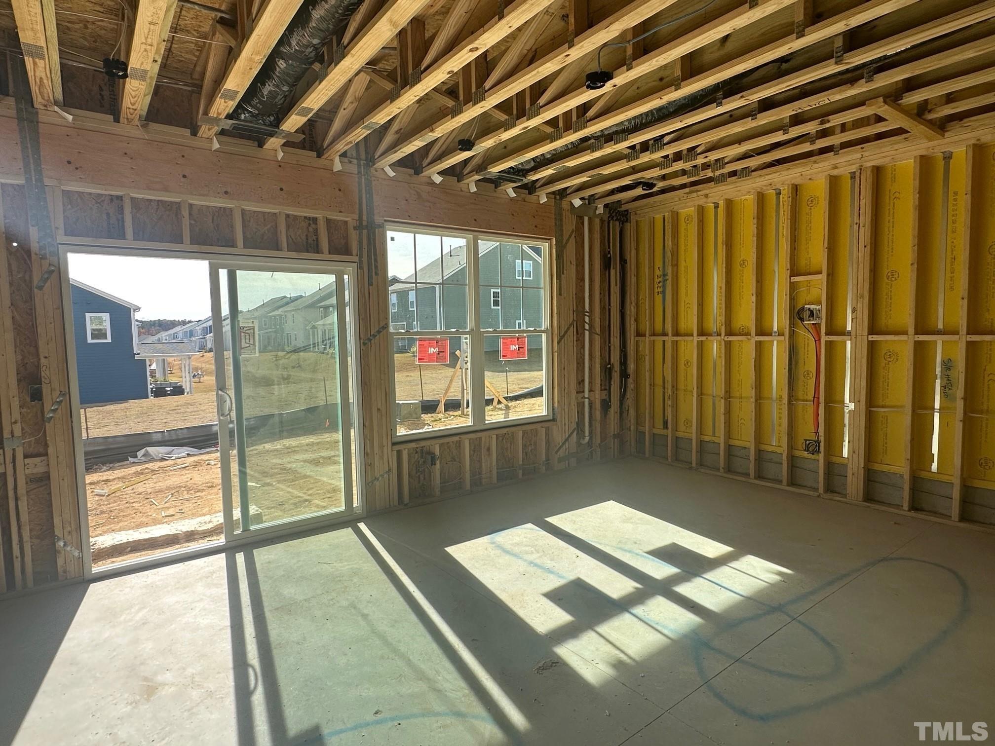2225 Kettle Falls Station, Unit 392 Apex, NC 27502 - Photo 5 of 52 a living room with stainless steel appliances granite countertop furniture a rug and a glass door