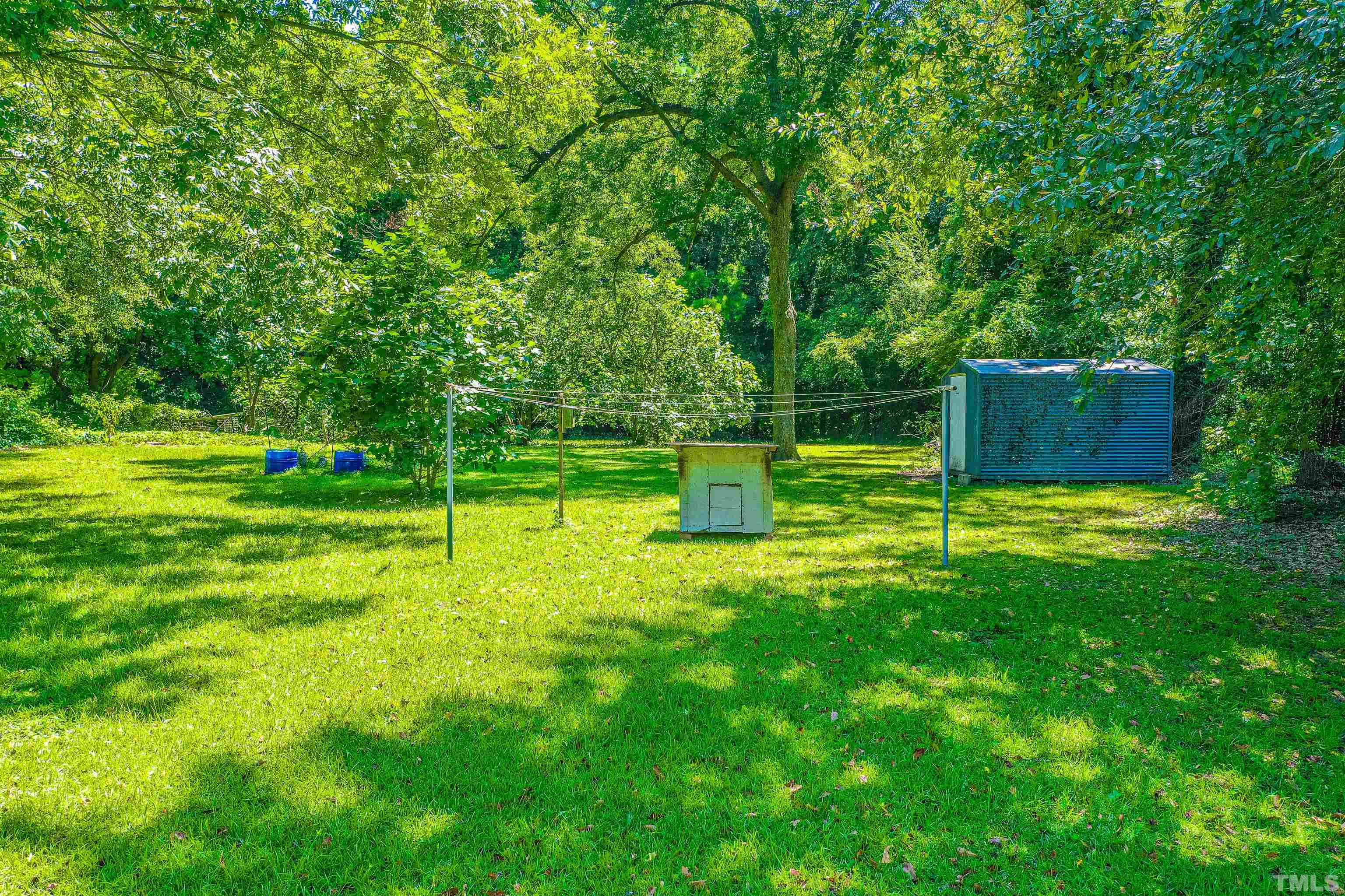 457 Rose Lane Raleigh, NC 27610 - Photo 17 of 26 a view of a park with a slide