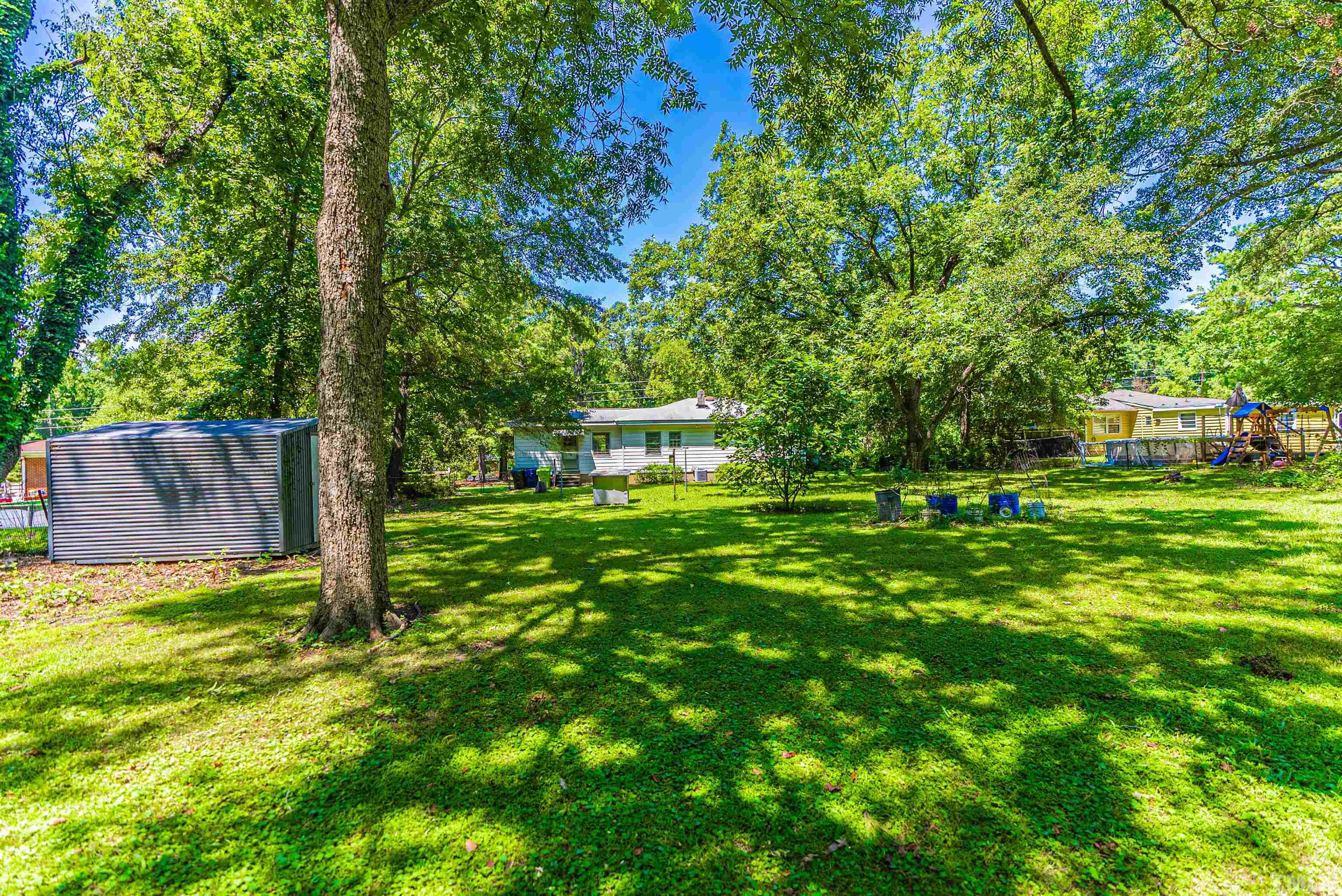 457 Rose Lane Raleigh, NC 27610 - Photo 19 of 26 a view of a back yard