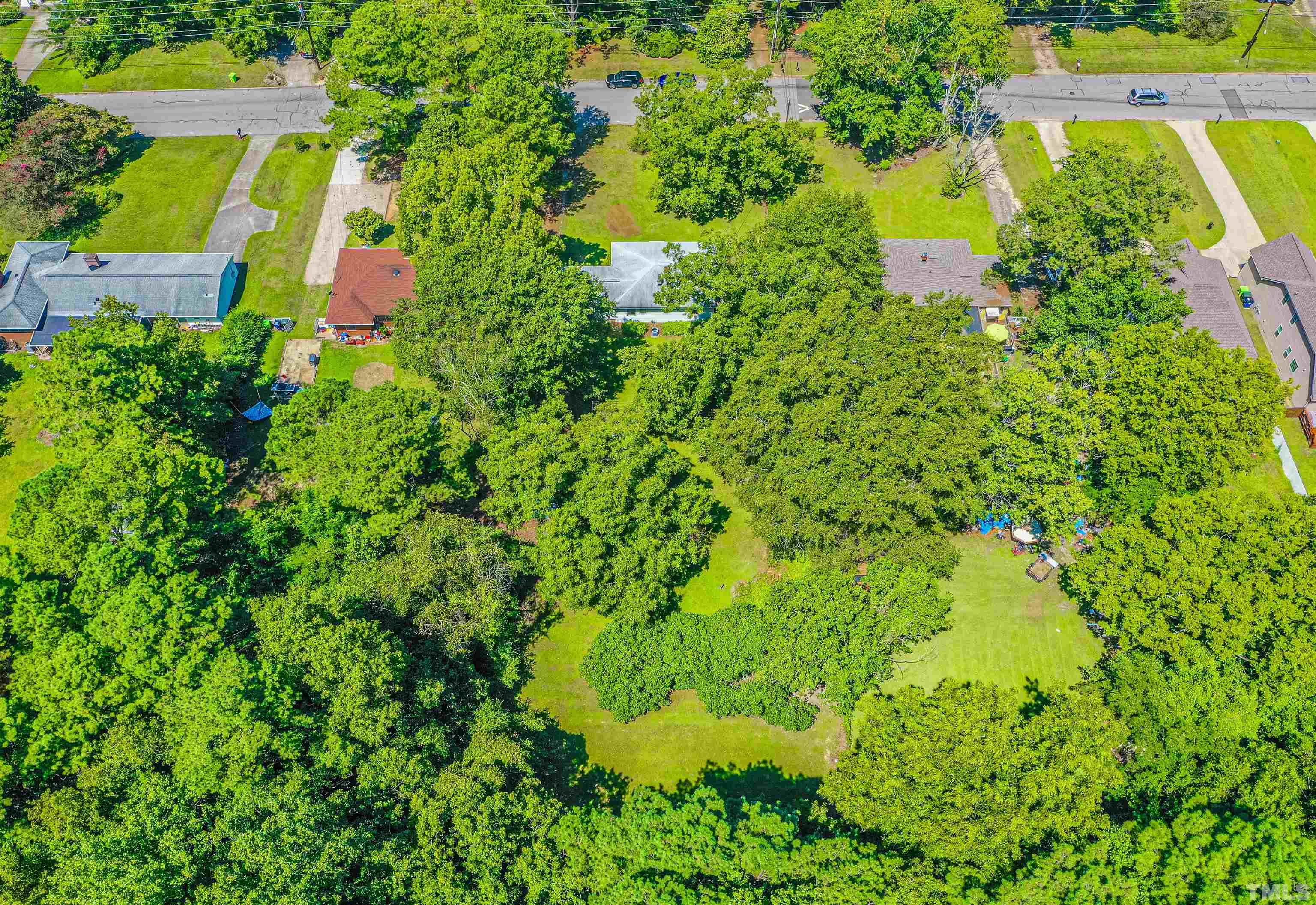 457 Rose Lane Raleigh, NC 27610 - Photo 25 of 26 an aerial view of residential house with an outdoor space and seating