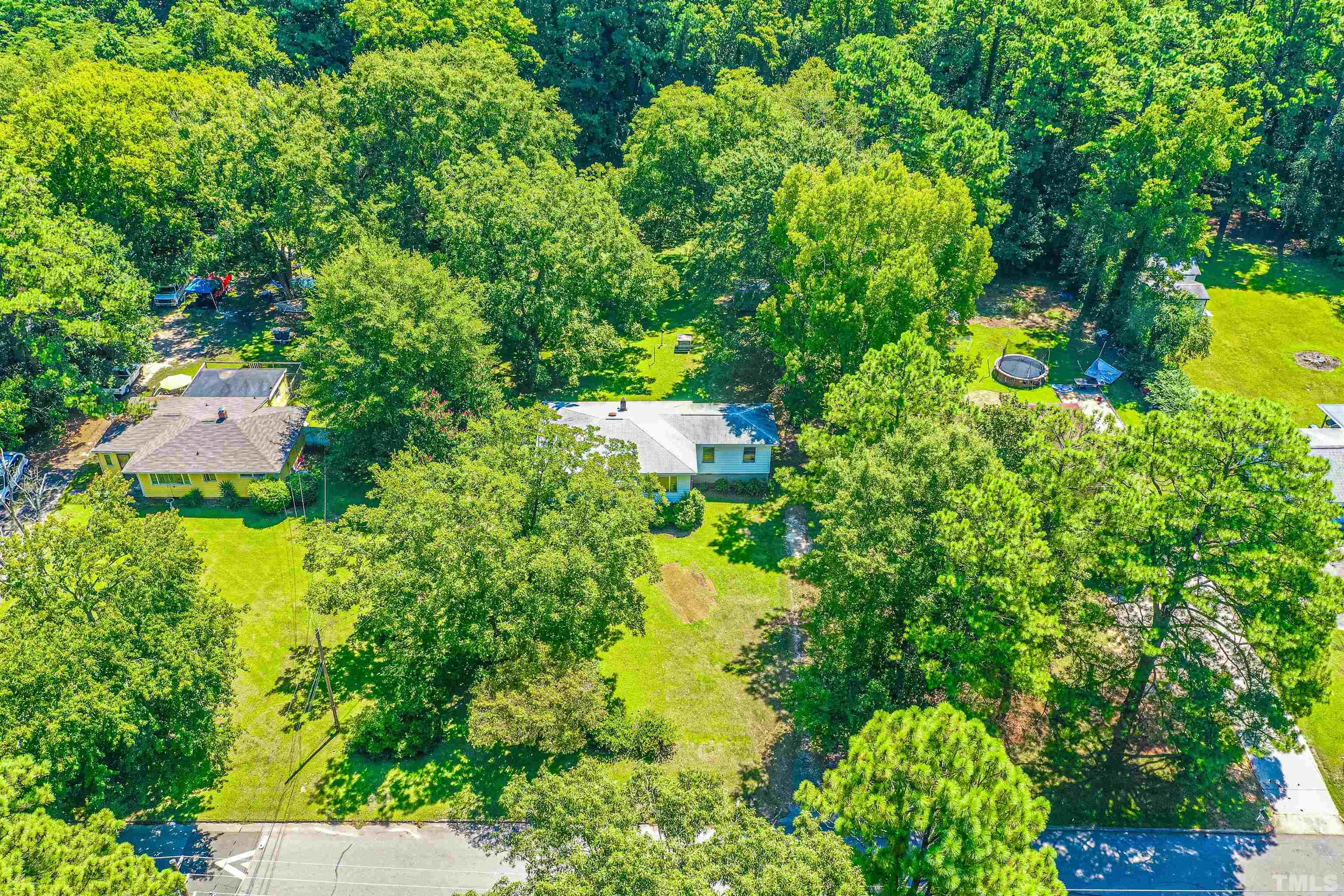 457 Rose Lane Raleigh, NC 27610 - Photo 4 of 26 a view of a garden