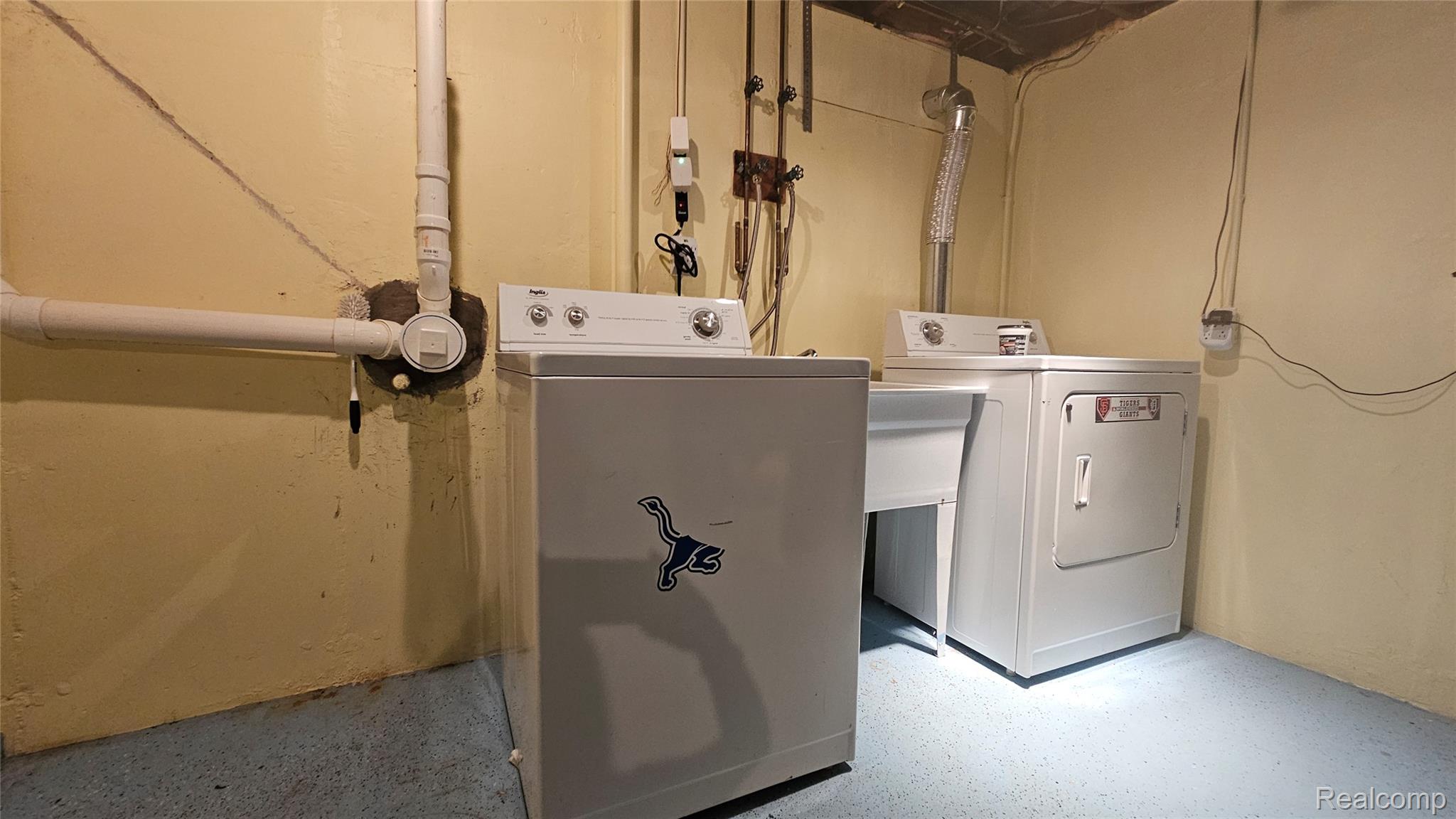6778 Strawberry Lake Road Dexter, MI 48130 - Photo 17 of 20 Laundry Area