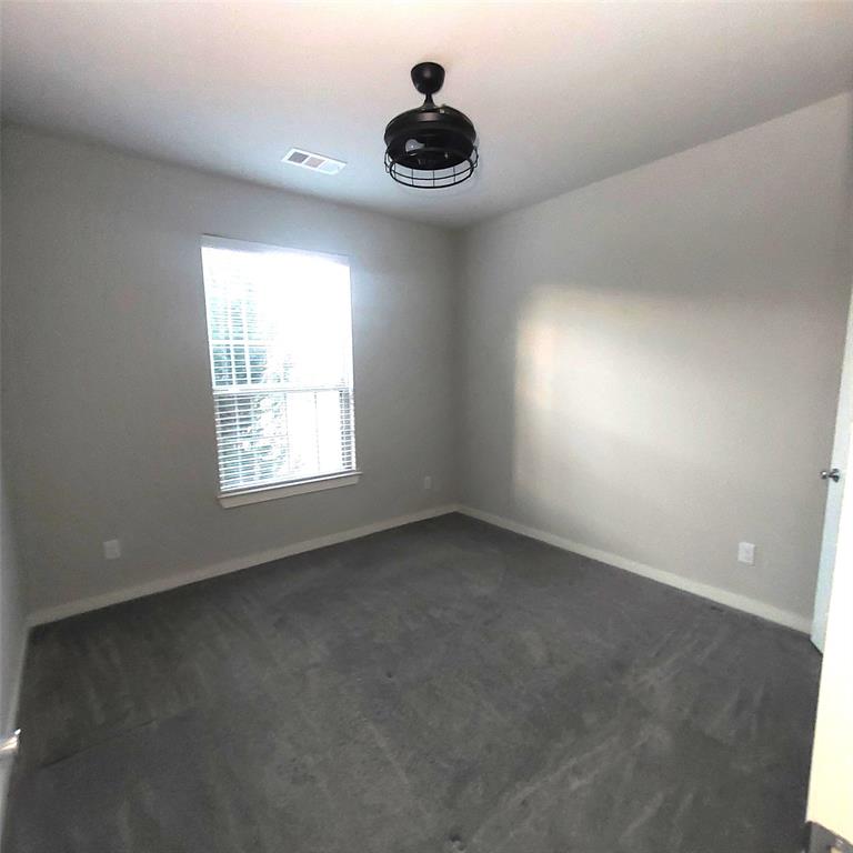 1813 Huntsman Way Forney, TX 75126 - Photo 12 of 18 an empty room with a window