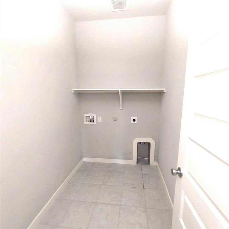 1813 Huntsman Way Forney, TX 75126 - Photo 17 of 18 a view of room with cabinet