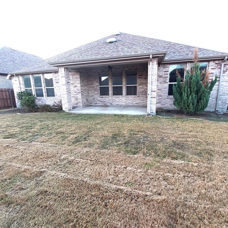 1813 Huntsman Way Forney, TX 75126 - Photo 18 of 18 a front view of a house with a garden