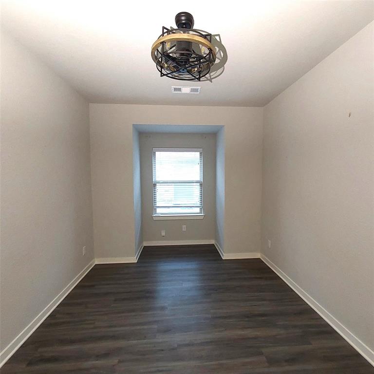 1813 Huntsman Way Forney, TX 75126 - Photo 10 of 18 a kitchen with a hard wood floor