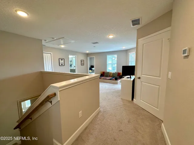a bathroom with a double vanity sink mirror double shower and a bathtub
