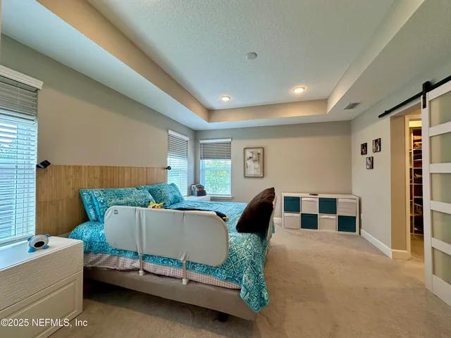 a view of a living room and dining room