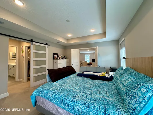 a living room with furniture window and a table