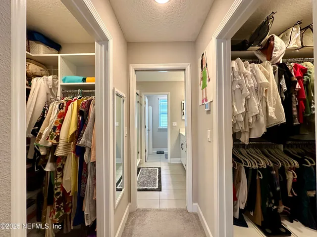 a bathroom with a sink double vanity and a mirror